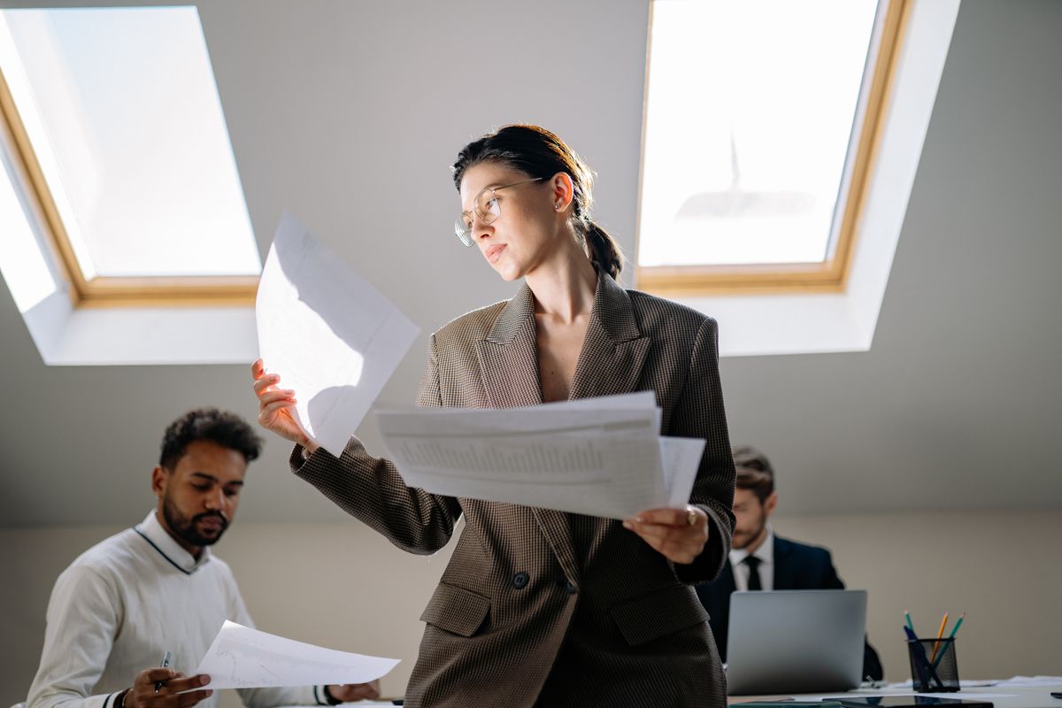 Professionals reviewing pension documents